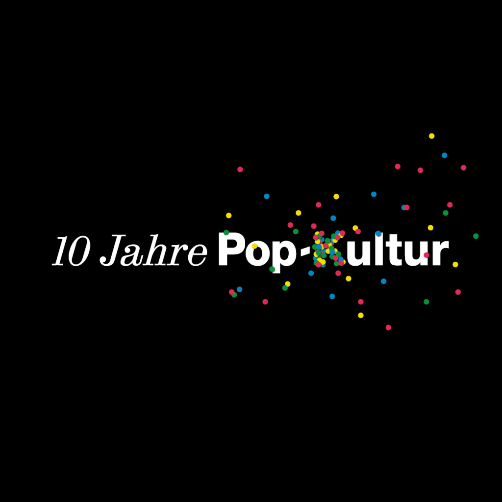 White lettering on a black background ‘10 years of Pop-Kultur’, colourful confetti scattered around the letterin